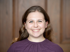 Headshot of brunette woman smiling 